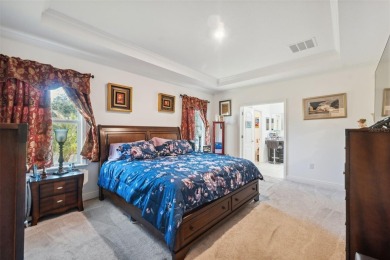 This exquisite 4-bedroom, 3-bathroom home in Oak Village of on Sugarmill Woods Golf and Country Club in Florida - for sale on GolfHomes.com, golf home, golf lot