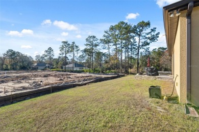 This exquisite 4-bedroom, 3-bathroom home in Oak Village of on Sugarmill Woods Golf and Country Club in Florida - for sale on GolfHomes.com, golf home, golf lot