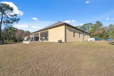 This exquisite 4-bedroom, 3-bathroom home in Oak Village of on Sugarmill Woods Golf and Country Club in Florida - for sale on GolfHomes.com, golf home, golf lot