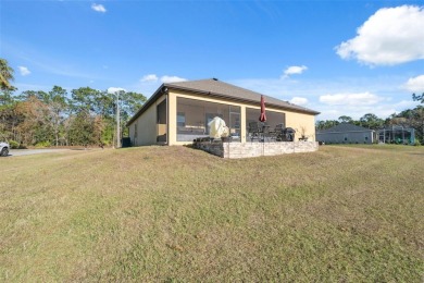 This exquisite 4-bedroom, 3-bathroom home in Oak Village of on Sugarmill Woods Golf and Country Club in Florida - for sale on GolfHomes.com, golf home, golf lot