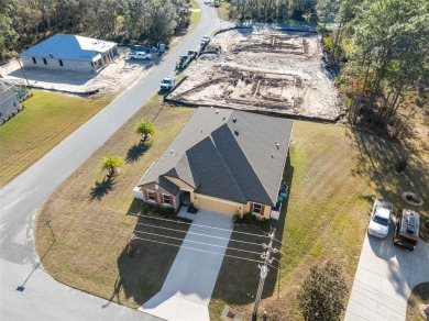 This exquisite 4-bedroom, 3-bathroom home in Oak Village of on Sugarmill Woods Golf and Country Club in Florida - for sale on GolfHomes.com, golf home, golf lot