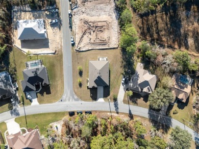 This exquisite 4-bedroom, 3-bathroom home in Oak Village of on Sugarmill Woods Golf and Country Club in Florida - for sale on GolfHomes.com, golf home, golf lot