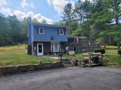 Welcome to your serene retreat at 372 Schuirman Rd, nestled near on Valley View Country Club, Inc. in West Virginia - for sale on GolfHomes.com, golf home, golf lot