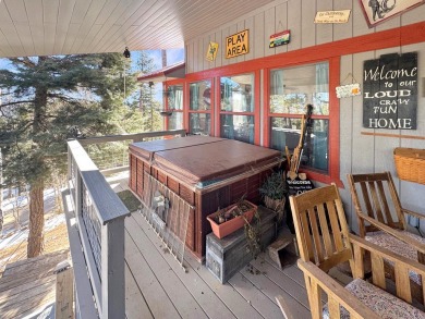 If you are looking for a mountain getaway, this charming on Angel Fire Resort Country Club in New Mexico - for sale on GolfHomes.com, golf home, golf lot