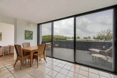 Welcome to a beautiful hidden gem of tropical paradise on on Longboat Key Golf Club in Florida - for sale on GolfHomes.com, golf home, golf lot