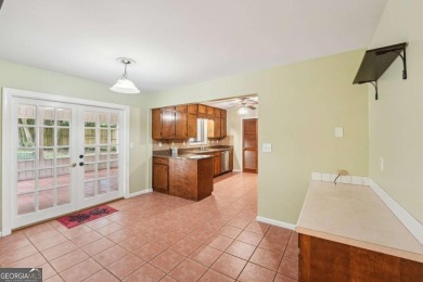 Mid-Century Ranch in Indian Hills - Upgraded & Rare Opportunity! on Indian Hills Country Club in Georgia - for sale on GolfHomes.com, golf home, golf lot