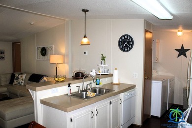 2006 home in Cypress Creek Village, a premier 55+ community on Cypresswood Golf and Country Club in Florida - for sale on GolfHomes.com, golf home, golf lot