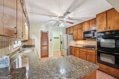 Mid-Century Ranch in Indian Hills - Upgraded & Rare Opportunity! on Indian Hills Country Club in Georgia - for sale on GolfHomes.com, golf home, golf lot