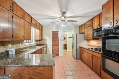 Mid-Century Ranch in Indian Hills - Upgraded & Rare Opportunity! on Indian Hills Country Club in Georgia - for sale on GolfHomes.com, golf home, golf lot