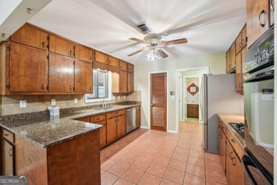 Mid-Century Ranch in Indian Hills - Upgraded & Rare Opportunity! on Indian Hills Country Club in Georgia - for sale on GolfHomes.com, golf home, golf lot