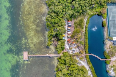 Welcome to a beautiful hidden gem of tropical paradise on on Longboat Key Golf Club in Florida - for sale on GolfHomes.com, golf home, golf lot