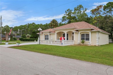 This beautifully designed concrete block stucco home stands out on The Grand Club Cypress Course in Florida - for sale on GolfHomes.com, golf home, golf lot