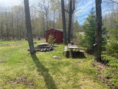 2 lots, nice location! 2 bedroom, 1 bath mobile home selling *AS on Hardwoods Golf Club At Mille Lacs in Minnesota - for sale on GolfHomes.com, golf home, golf lot