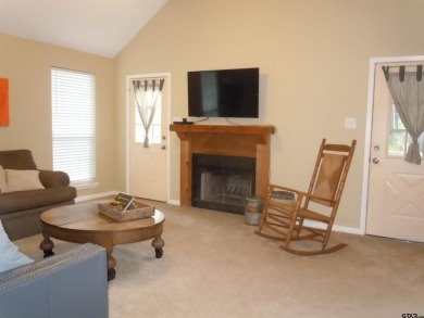 Remarkable 3-2 home situated on three lots, combined for a total on Holly Lake Ranch Golf Club in Texas - for sale on GolfHomes.com, golf home, golf lot