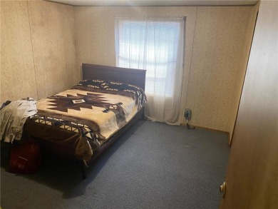 2 lots, nice location! 2 bedroom, 1 bath mobile home selling *AS on Hardwoods Golf Club At Mille Lacs in Minnesota - for sale on GolfHomes.com, golf home, golf lot