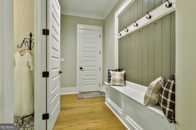 Welcome to 129 Fairway Run, gracefully positioned within the on The Club River Forest in Georgia - for sale on GolfHomes.com, golf home, golf lot