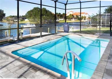 The ultimate saltwater lifestyle awaits in this like-new 2021 on Palm Harbor Golf Club in Florida - for sale on GolfHomes.com, golf home, golf lot