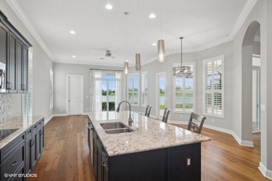 Nestled within the secured, resort-style gates of PGA Village on  in Florida - for sale on GolfHomes.com, golf home, golf lot
