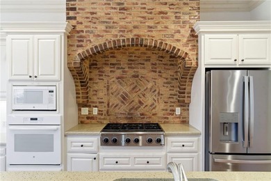 Welcome to this beautiful home located in the gated community of on Shadow Valley Country Club in Arkansas - for sale on GolfHomes.com, golf home, golf lot