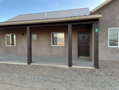 This beautiful home in the Vista Linda area With a 2 minute on Taos Country Club in New Mexico - for sale on GolfHomes.com, golf home, golf lot