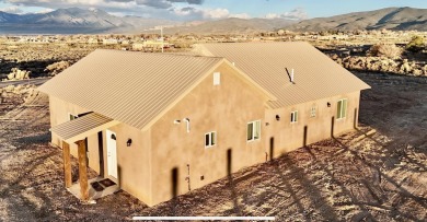 This beautiful home in the Vista Linda area With a 2 minute on Taos Country Club in New Mexico - for sale on GolfHomes.com, golf home, golf lot