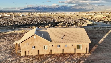 This beautiful home in the Vista Linda area With a 2 minute on Taos Country Club in New Mexico - for sale on GolfHomes.com, golf home, golf lot