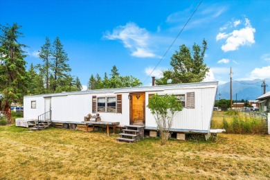 You will love this beautiful rustic cabin built in 1920 on .163 on Meadow Creek Golf Course in Montana - for sale on GolfHomes.com, golf home, golf lot