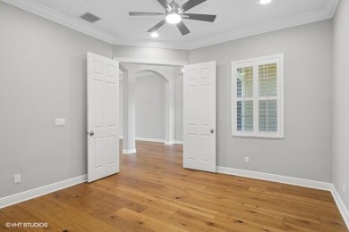 Nestled within the secured, resort-style gates of PGA Village on  in Florida - for sale on GolfHomes.com, golf home, golf lot