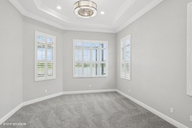 Nestled within the secured, resort-style gates of PGA Village on  in Florida - for sale on GolfHomes.com, golf home, golf lot
