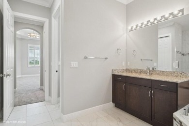 Nestled within the secured, resort-style gates of PGA Village on  in Florida - for sale on GolfHomes.com, golf home, golf lot