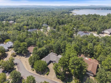 Explore this fantastic opportunity at 32 Promesa Place in Hot on Magellan Golf Course in Arkansas - for sale on GolfHomes.com, golf home, golf lot