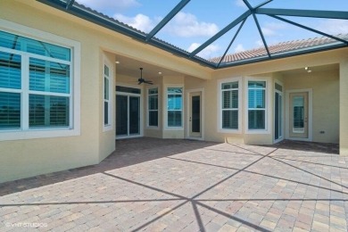 Nestled within the secured, resort-style gates of PGA Village on  in Florida - for sale on GolfHomes.com, golf home, golf lot