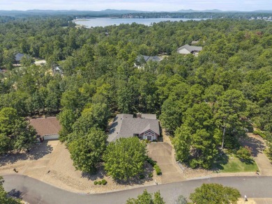 Explore this fantastic opportunity at 32 Promesa Place in Hot on Magellan Golf Course in Arkansas - for sale on GolfHomes.com, golf home, golf lot