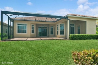 Nestled within the secured, resort-style gates of PGA Village on  in Florida - for sale on GolfHomes.com, golf home, golf lot