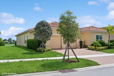 Nestled within the secured, resort-style gates of PGA Village on  in Florida - for sale on GolfHomes.com, golf home, golf lot