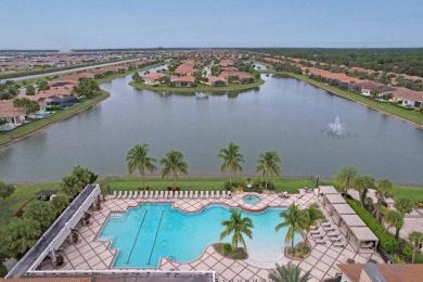 Nestled within the secured, resort-style gates of PGA Village on  in Florida - for sale on GolfHomes.com, golf home, golf lot