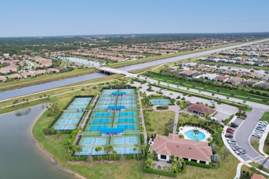 Nestled within the secured, resort-style gates of PGA Village on  in Florida - for sale on GolfHomes.com, golf home, golf lot