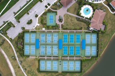 Nestled within the secured, resort-style gates of PGA Village on  in Florida - for sale on GolfHomes.com, golf home, golf lot