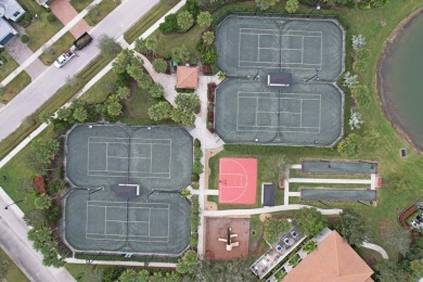 Nestled within the secured, resort-style gates of PGA Village on  in Florida - for sale on GolfHomes.com, golf home, golf lot