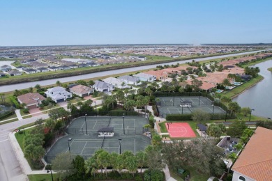 Nestled within the secured, resort-style gates of PGA Village on  in Florida - for sale on GolfHomes.com, golf home, golf lot