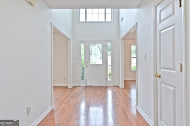 PRIME LOCATION! Beautiful traditional-style single-family home on TPC At Sugarloaf Golf Club in Georgia - for sale on GolfHomes.com, golf home, golf lot