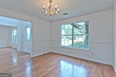 PRIME LOCATION! Beautiful traditional-style single-family home on TPC At Sugarloaf Golf Club in Georgia - for sale on GolfHomes.com, golf home, golf lot