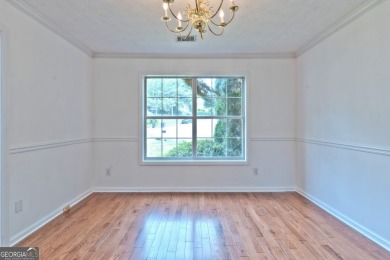 PRIME LOCATION! Beautiful traditional-style single-family home on TPC At Sugarloaf Golf Club in Georgia - for sale on GolfHomes.com, golf home, golf lot