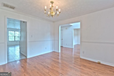 PRIME LOCATION! Beautiful traditional-style single-family home on TPC At Sugarloaf Golf Club in Georgia - for sale on GolfHomes.com, golf home, golf lot
