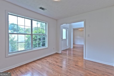 PRIME LOCATION! Beautiful traditional-style single-family home on TPC At Sugarloaf Golf Club in Georgia - for sale on GolfHomes.com, golf home, golf lot