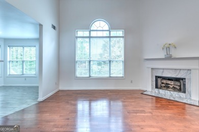 PRIME LOCATION! Beautiful traditional-style single-family home on TPC At Sugarloaf Golf Club in Georgia - for sale on GolfHomes.com, golf home, golf lot