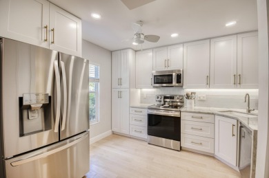 GORGEOUS IN RIVERBEND! Welcome to this terrific townhome with on Riverbend Golf Club in Florida - for sale on GolfHomes.com, golf home, golf lot