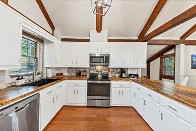 Step inside to discover a warm, inviting interior featuring on The Highlands Course at Lake Arrowhead in Georgia - for sale on GolfHomes.com, golf home, golf lot