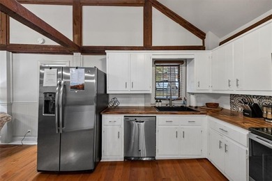 Step inside to discover a warm, inviting interior featuring on The Highlands Course at Lake Arrowhead in Georgia - for sale on GolfHomes.com, golf home, golf lot