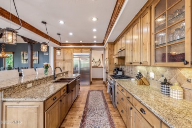 This custom-built, 5-bedroom single family home with separate on Sonnenalp Golf Club in Colorado - for sale on GolfHomes.com, golf home, golf lot